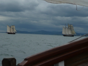 CLOUDS AND CANVAS: Three classic sailing vessels glide into Dublin Bay, schooner Soteria (foreground), Golden Leeu (right) and an unnamed gaff-rigged boat. June 2013